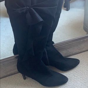 Calf length black heeled boots